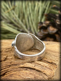 Magnolia Sterling Silver Salt Spoon Ring with a Garnet Gemstone